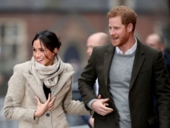 Le prince Harry et Meghan Markle, l’air relativement heureux et complices